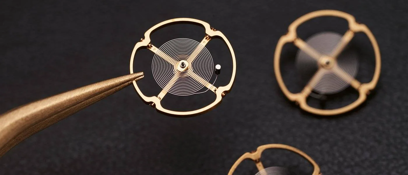 Montre balancier inertie variable